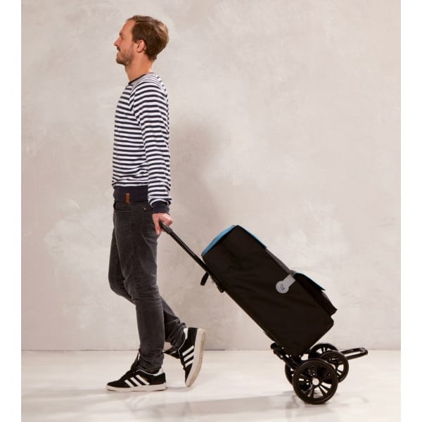 Saksalainen andersen ostoskärry kvartetti. Nelipyöräinen, tukeva runko. Käyttökuva kaksipyöräisenä.