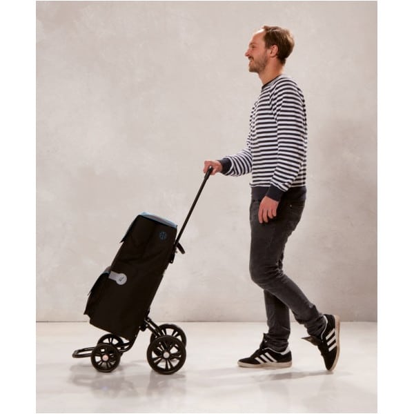 Saksalainen andersen ostoskärry kvartetti. Nelipyöräinen, tukeva runko. Käyttökuva nelipyöräisenä., kevyt työntää.