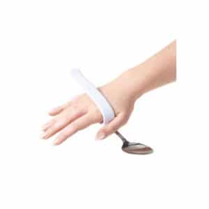 Lusikka, jossa helposti muotoiltavat kiinnikkeet käden ympärille, helpottaa syömistä silloin kun käsivoimat ovat heikentyneet.